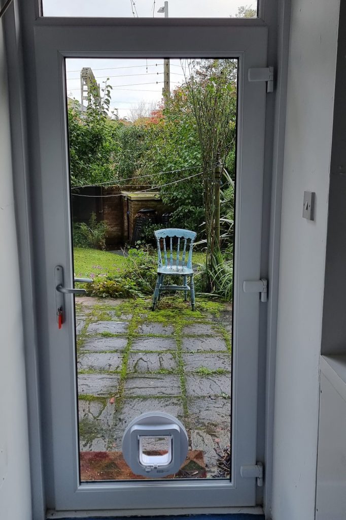 The same French doors after the handle and locking gear were replaced