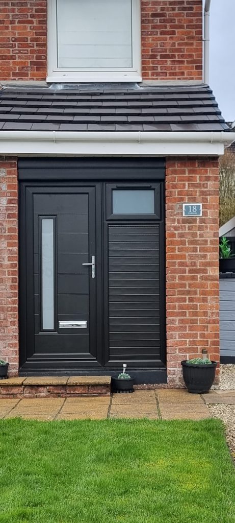 New anthracite grey composite door and matching side panel fitted to the same porch