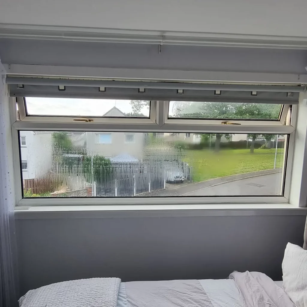 Misted double glazing softening the view of the street outside