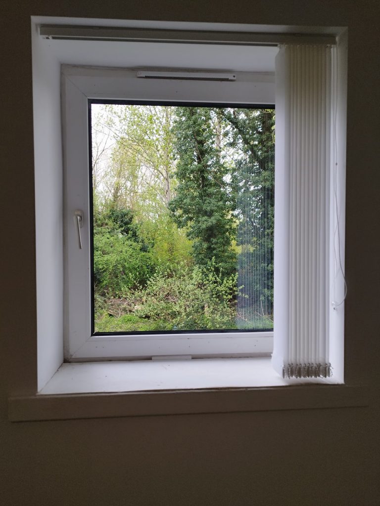 Clear view through the same window once the blown sealed unit was replaced
