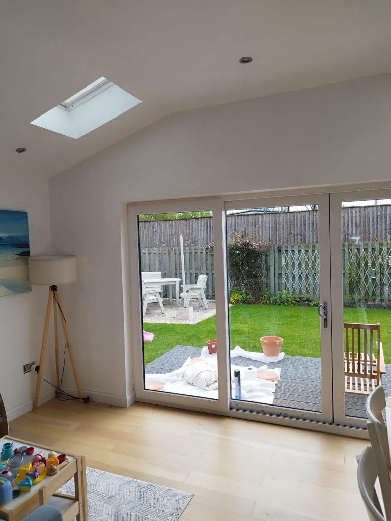 The same patio door after new toughened glass was fitted, garden visible through it