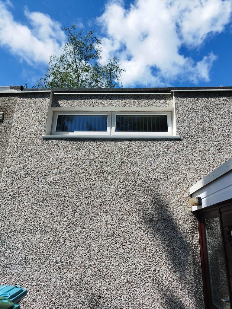 New white uPVC window fitted in the same opening, with trickle vent and restrictor
